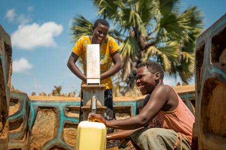 Uganda - Boys at well