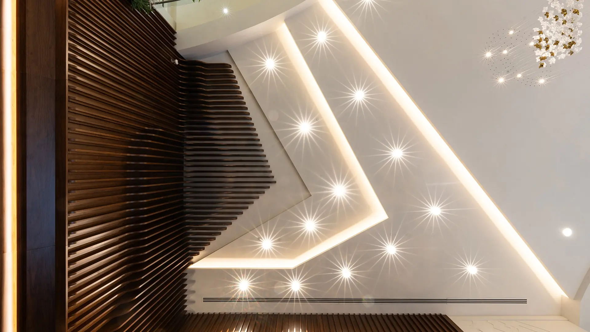 Intricate lighting features and modern wall cladding design at Bank Albilad KSA